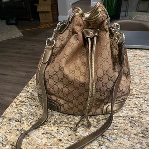 Gucci GG Guccissima Beige Canvas Drawstring Tote Shoulder bag.